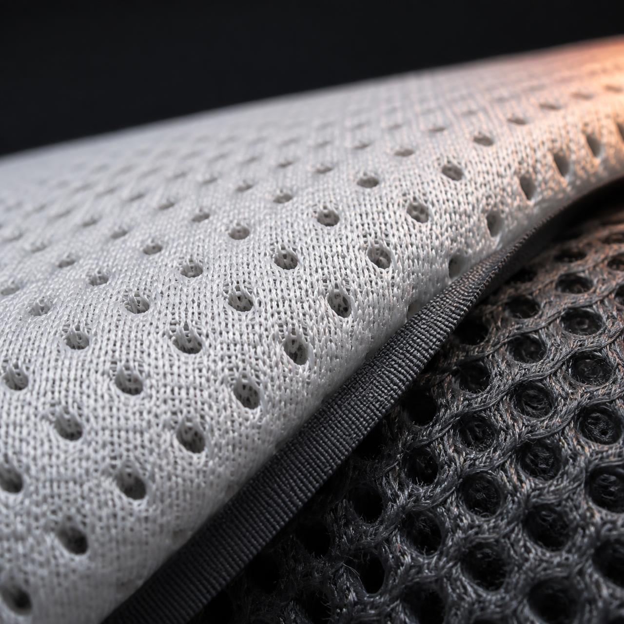 Macro detail of the cooling knit and breathable mesh layers